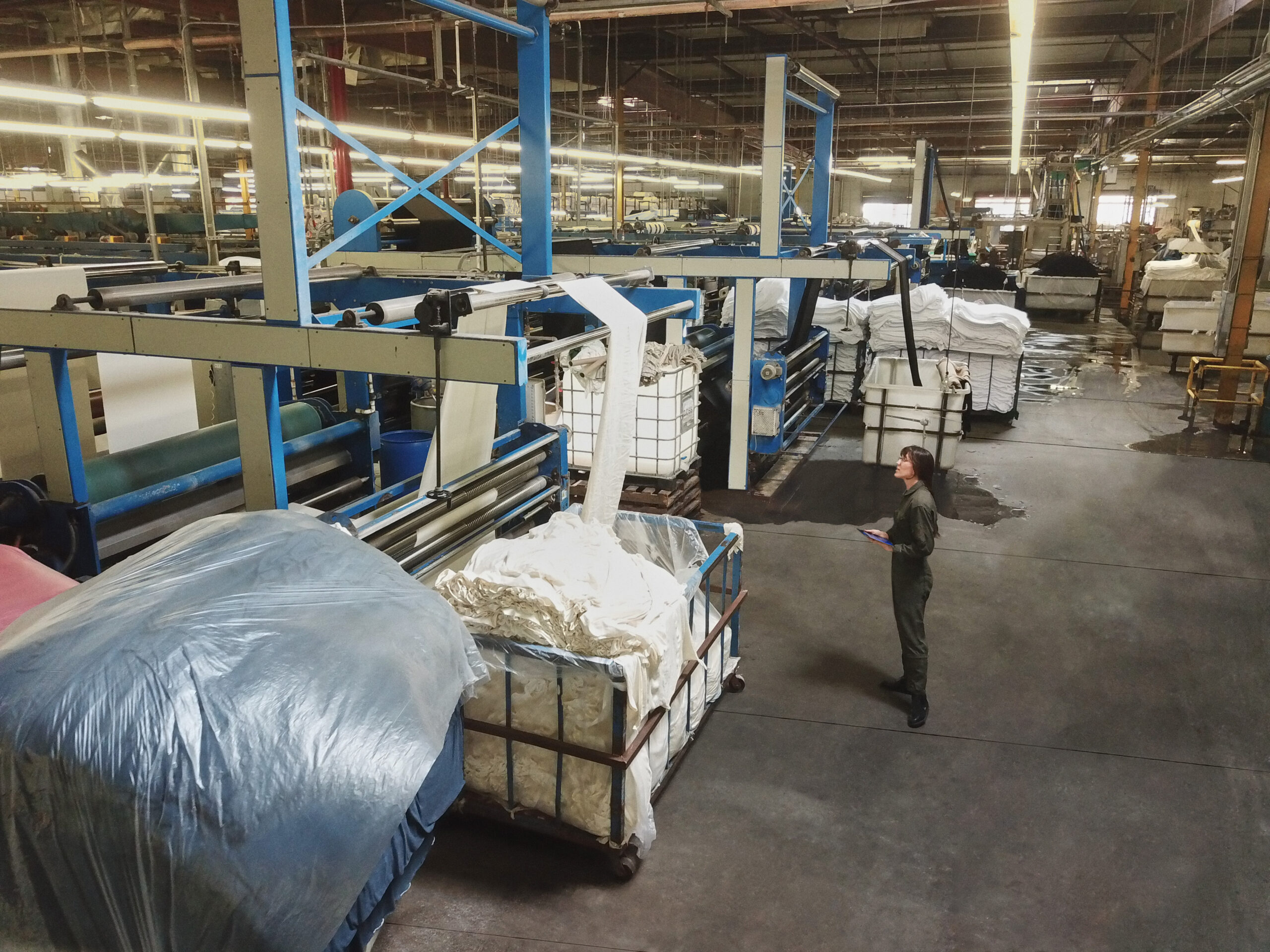 Photo of a worker taking inventory in a warehouse
