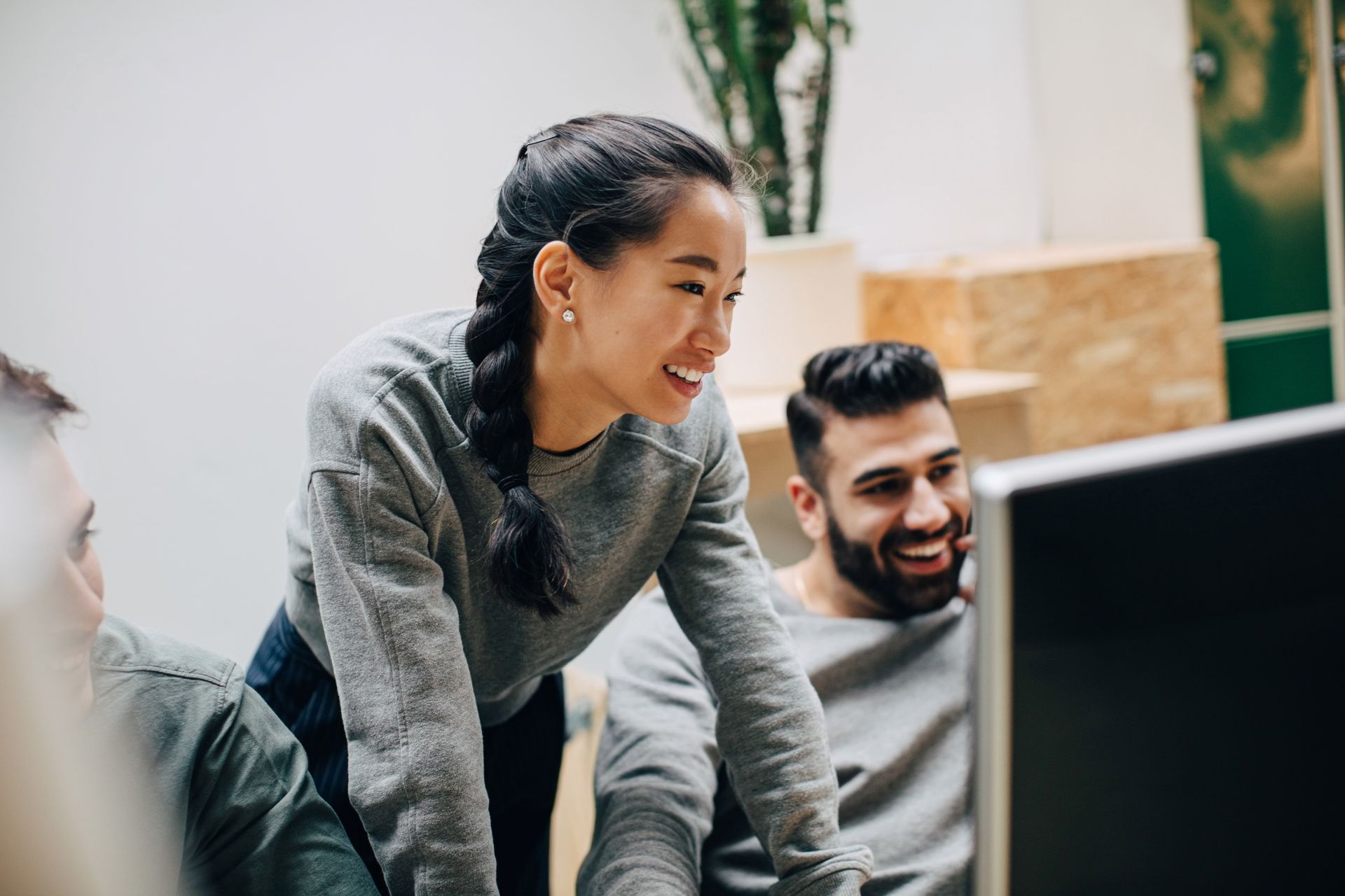 People collaborating in an office setting.