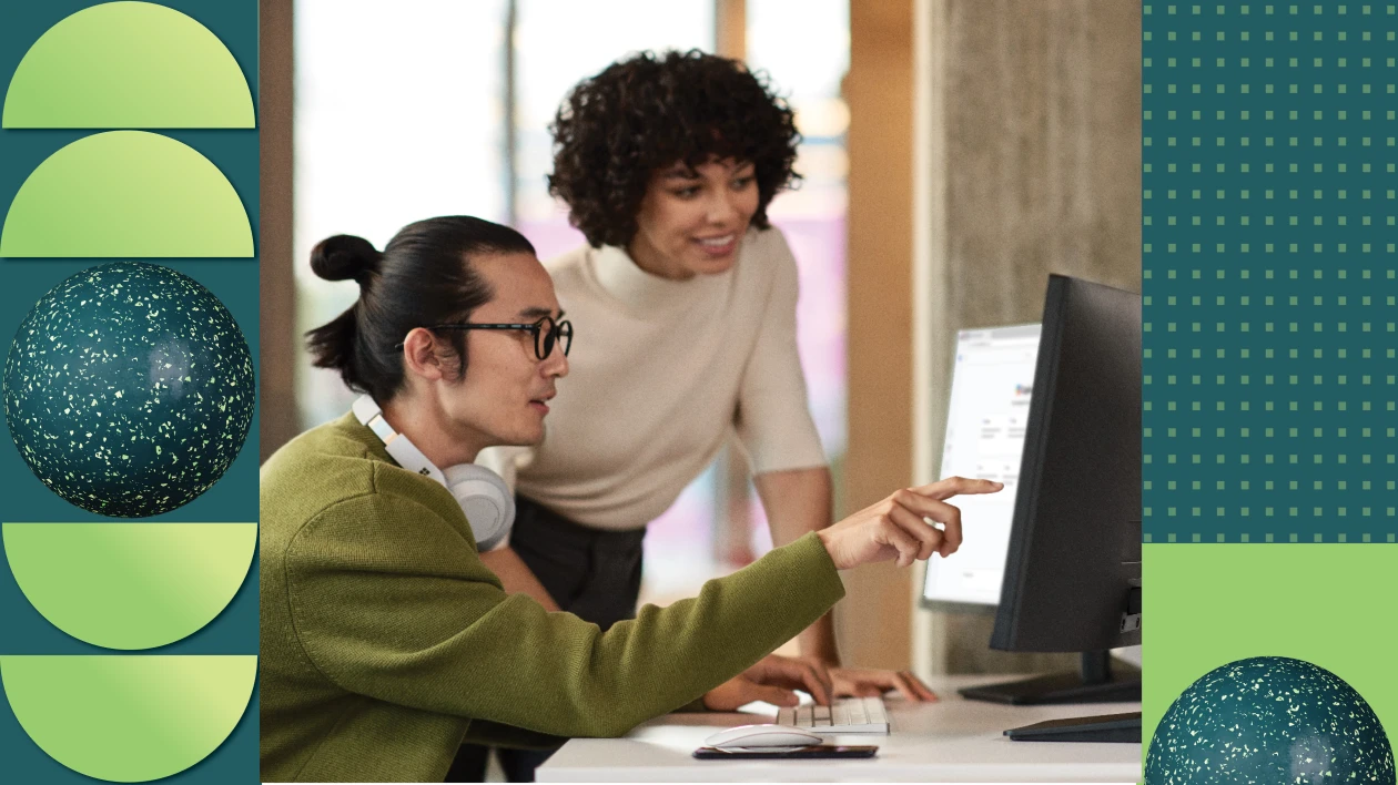 Two education professionals collaborating in a school office
