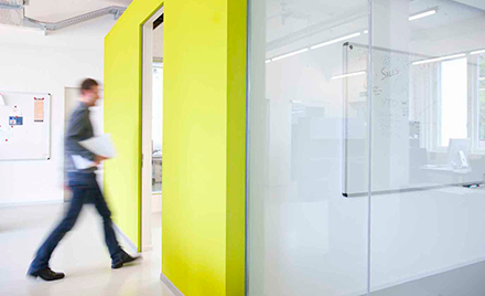 A worker walks into a meeting room at Accenture