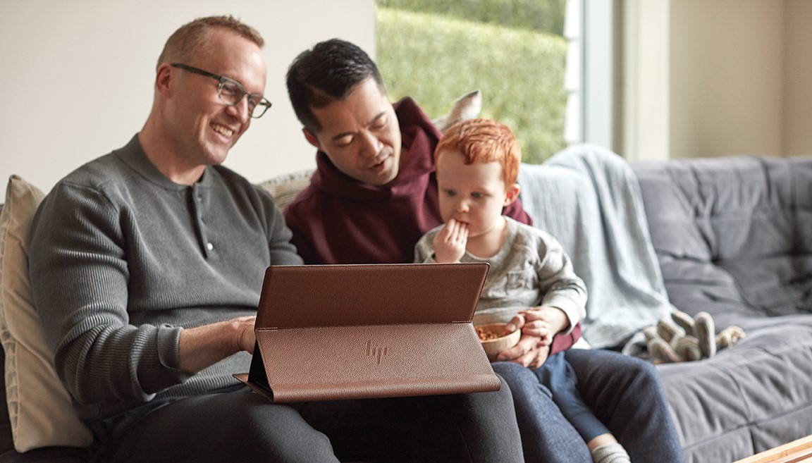 Family with fathers and son using HP Spectre X360 15