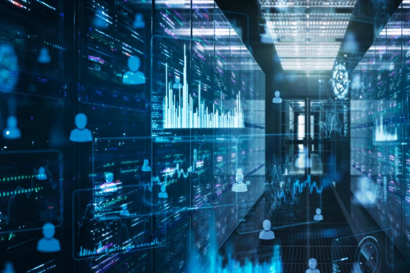 Futuristic server room with the flowing people and data in a blue color. Meant to represent digital evidence