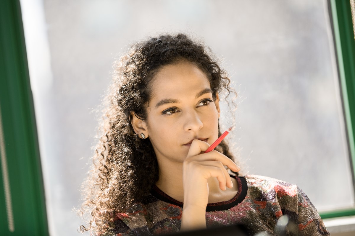 Young, small business female achieving in modern workplace