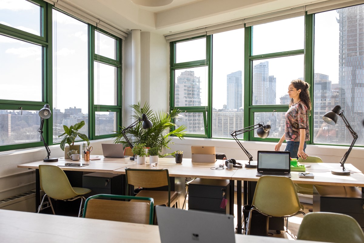 Young, small business female in modern workplace