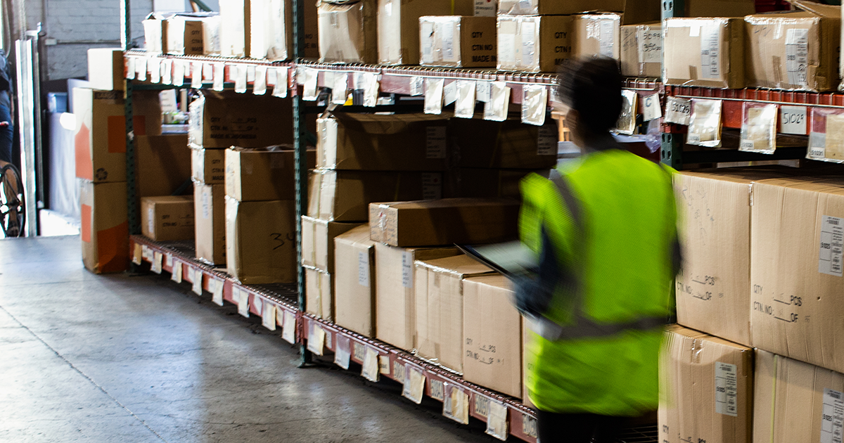 A worker in a warehouse