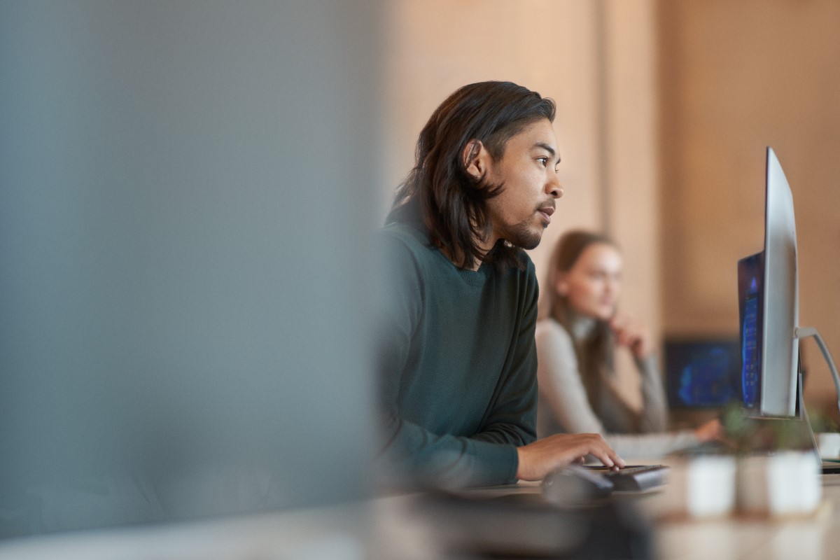 Worker in focused work with a neutral facial expression
