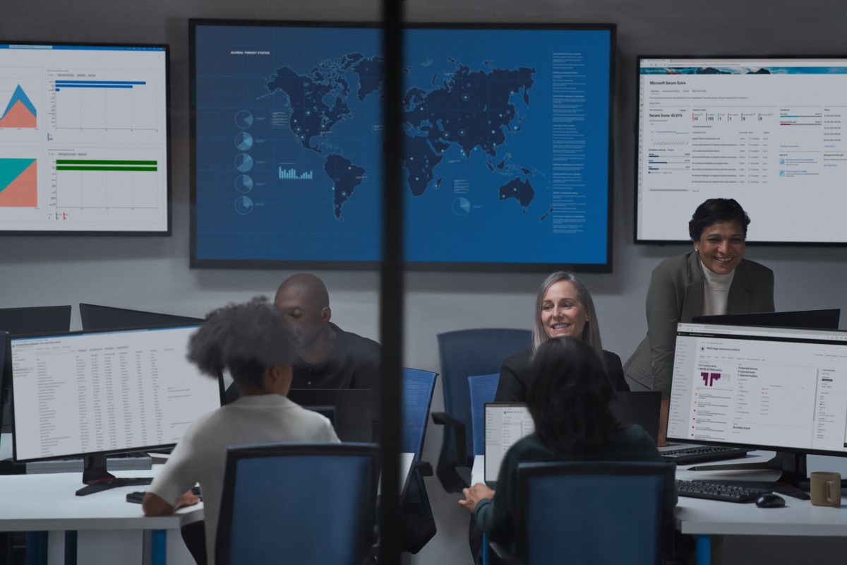 CISO (chief information security officer) collaborating with practitioners in a security operations center