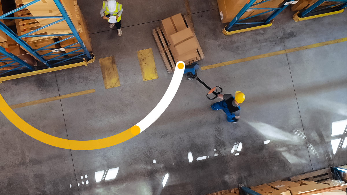 Two people working in a warehouse