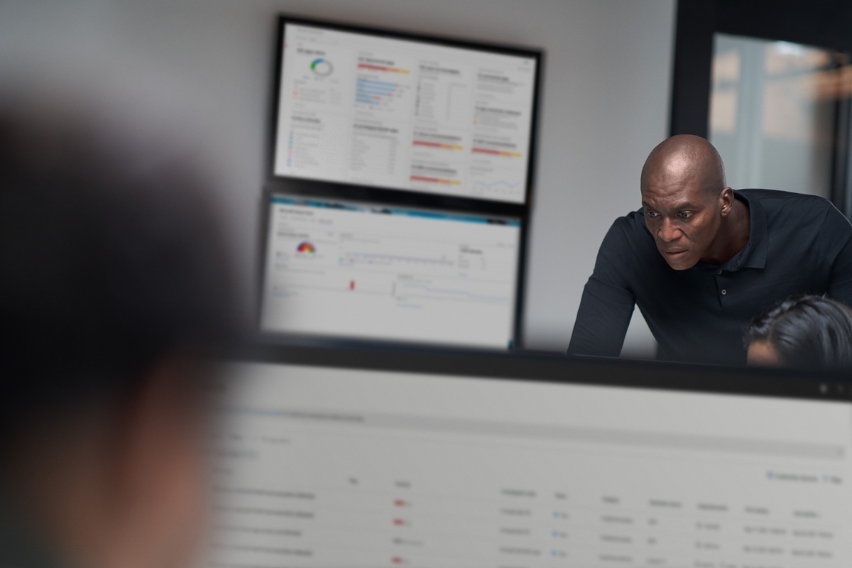 Chief information security officer collaborating in a security operations center