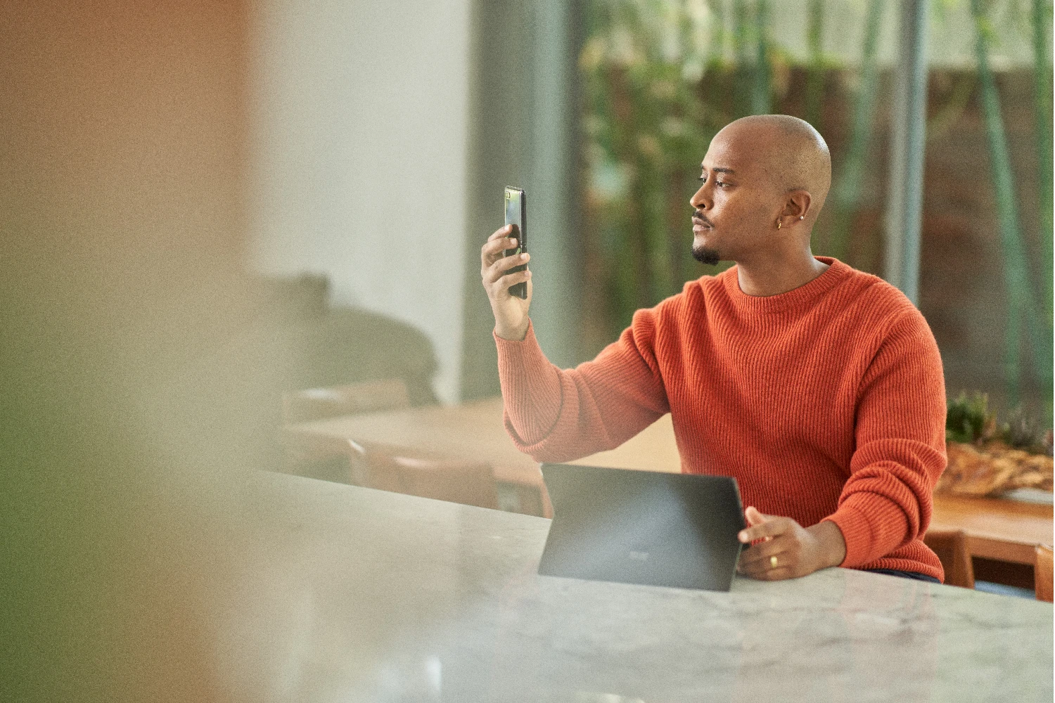 A man uses multifactor authentication.