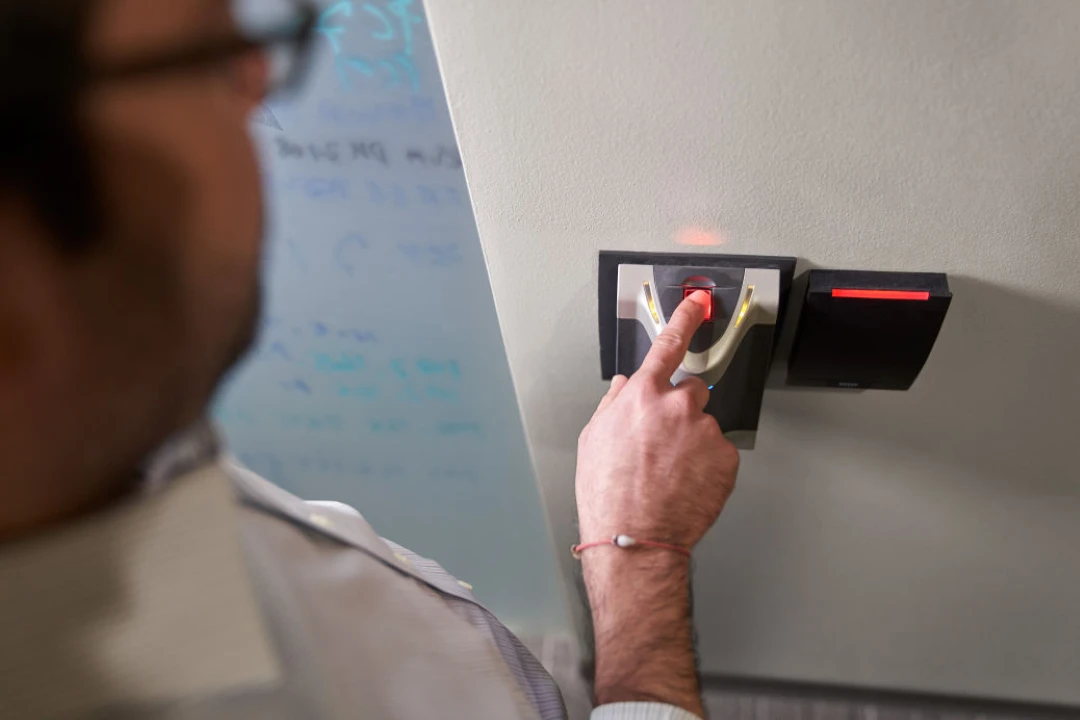 Man using fingerprint access tool