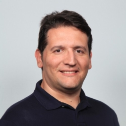 a man smiling for the camera