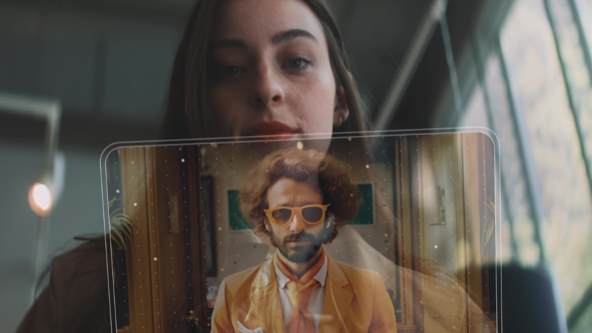 Image of women behind a transparent screen with a man in front